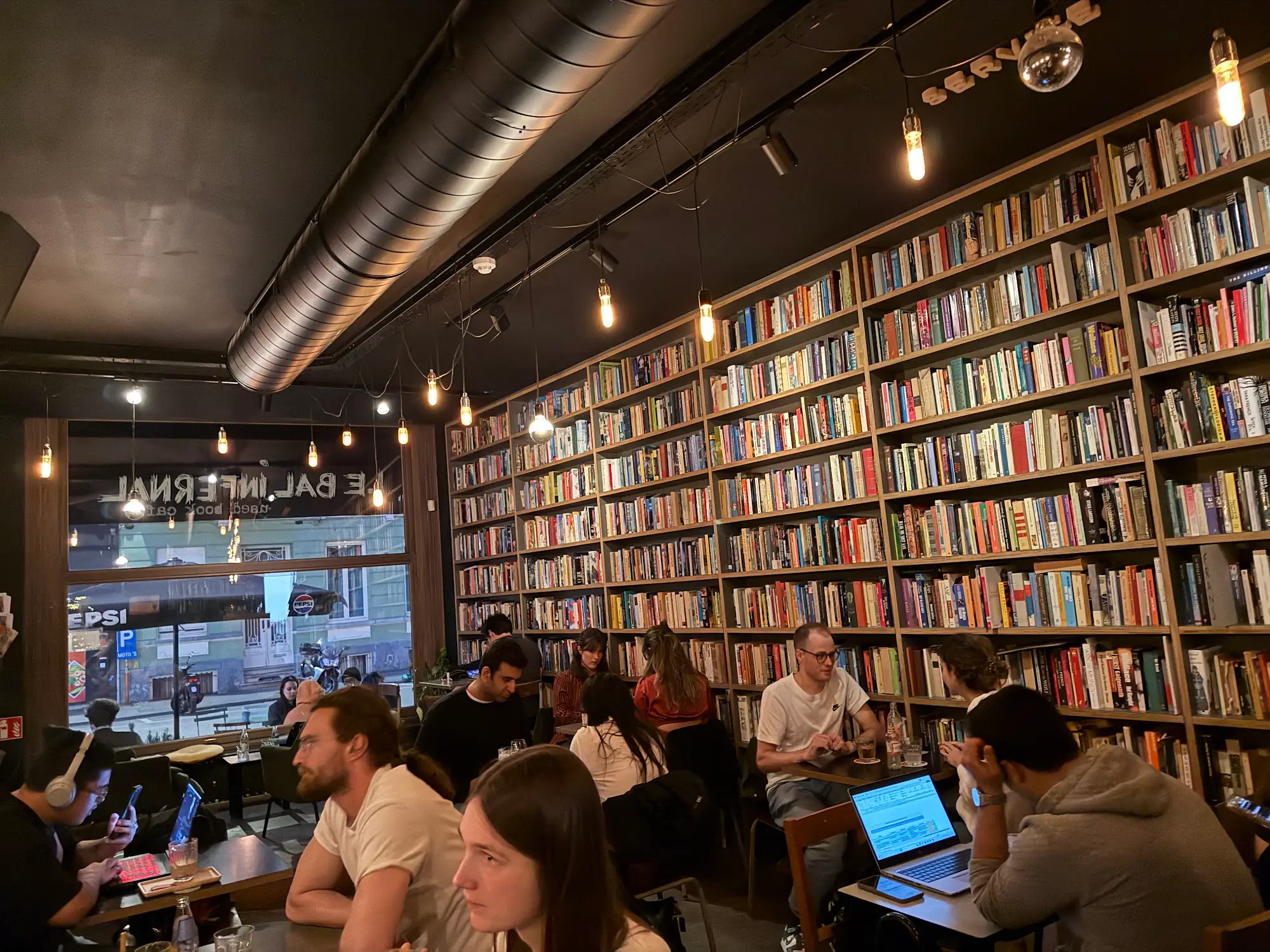 Le Bal Infernal interior with books