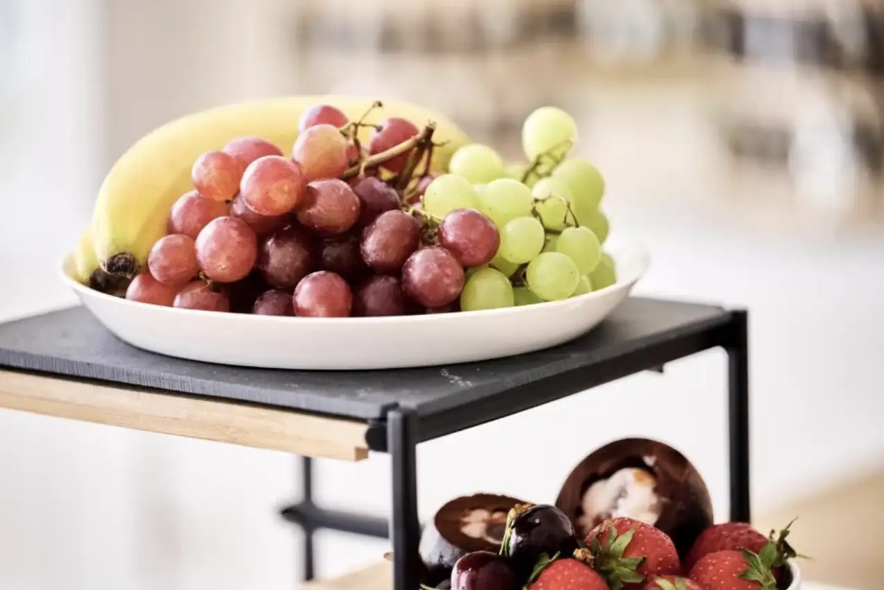 Fresh fruits beautifully arranged on tiered stand