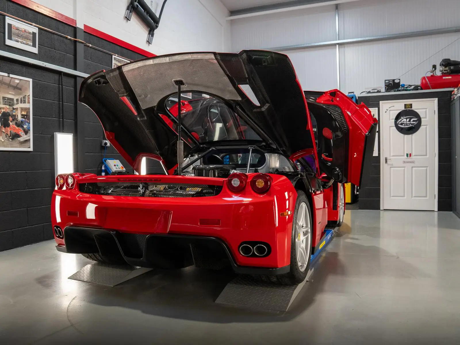 Ferrari Enzo in a professional workshop setting
