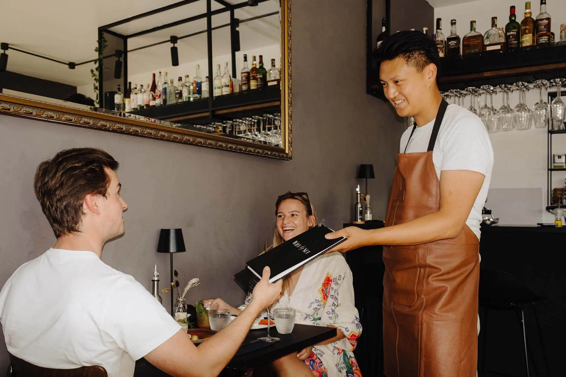 Waiter serving at WhyNot