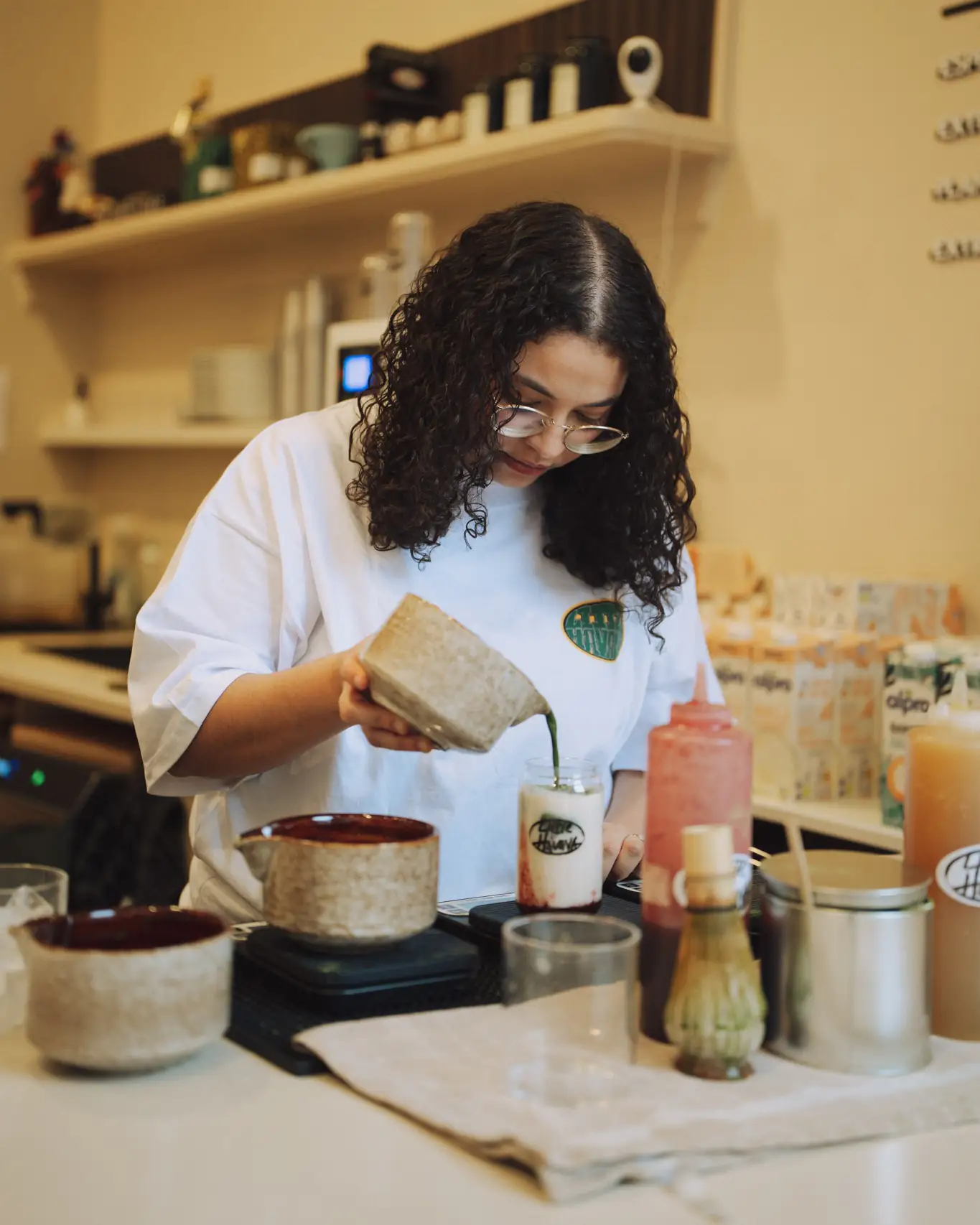 Barista making matcha