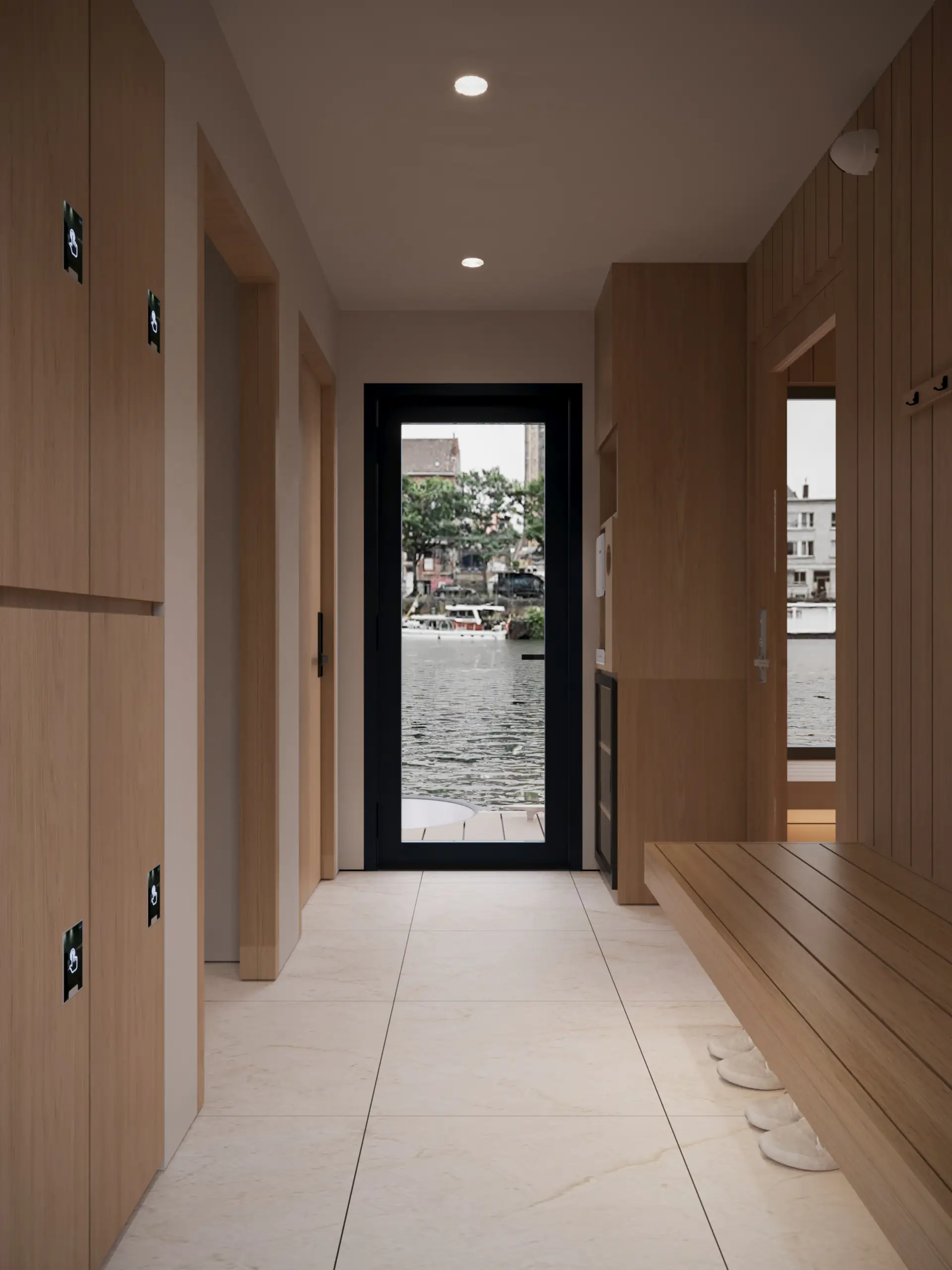 Modern hallway with light wood lockers leading to a glass door
