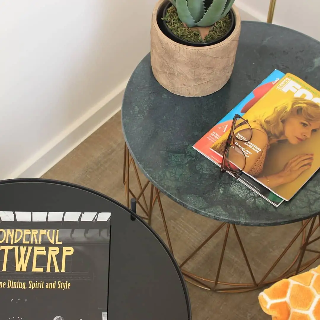 Detail of side tables with Wonderful Antwerp book