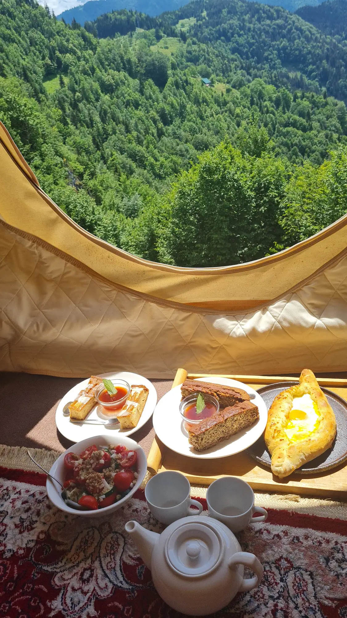 Vegetarian breakfast spread in glamping tent